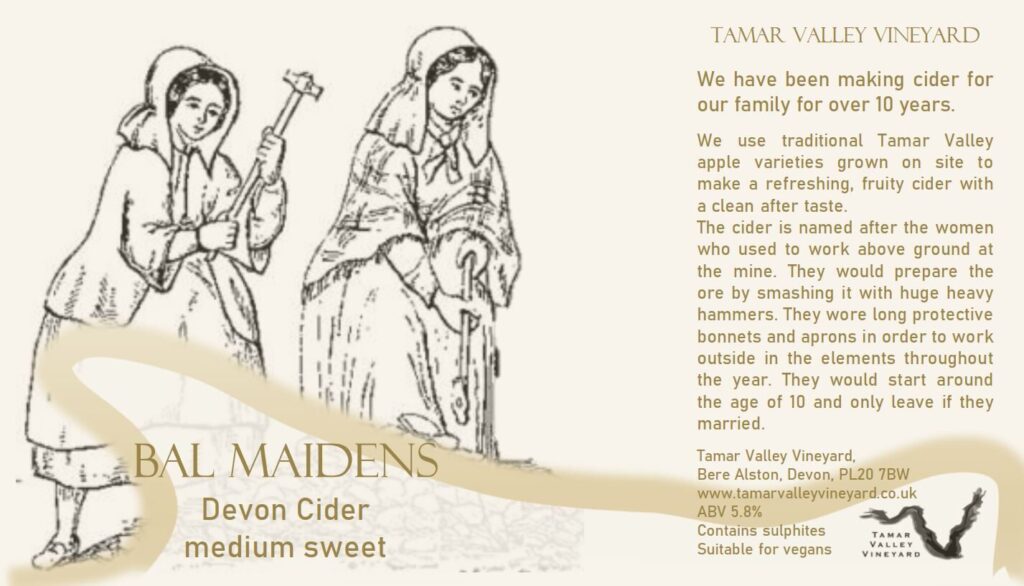 Line drawing image of two young women wearing bonnets and holding long-handled hammers.